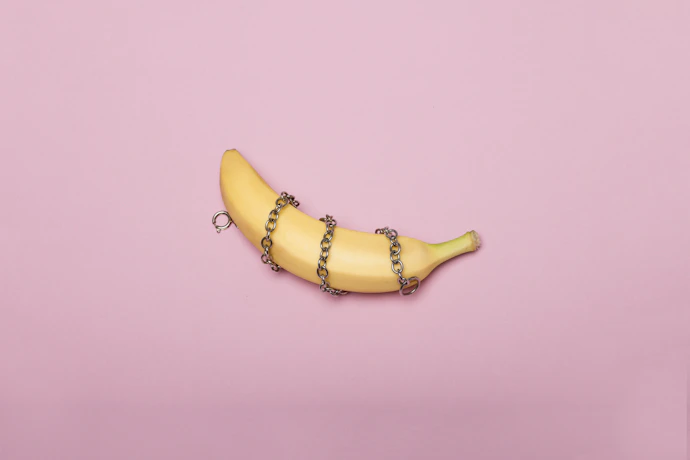 yellow banana on white surface