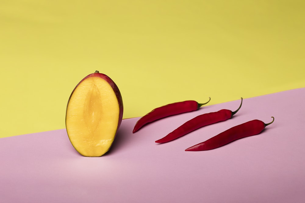 yellow lemon fruit on yellow surface