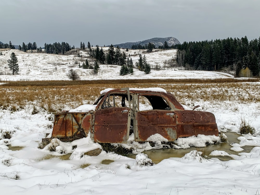 brown car covered with snow during daytime