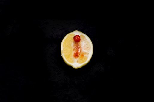 sliced fruit on black surface