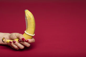 person holding yellow banana fruit