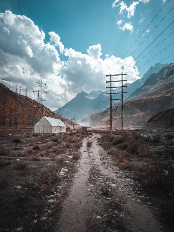 A mountain road winding through the valley