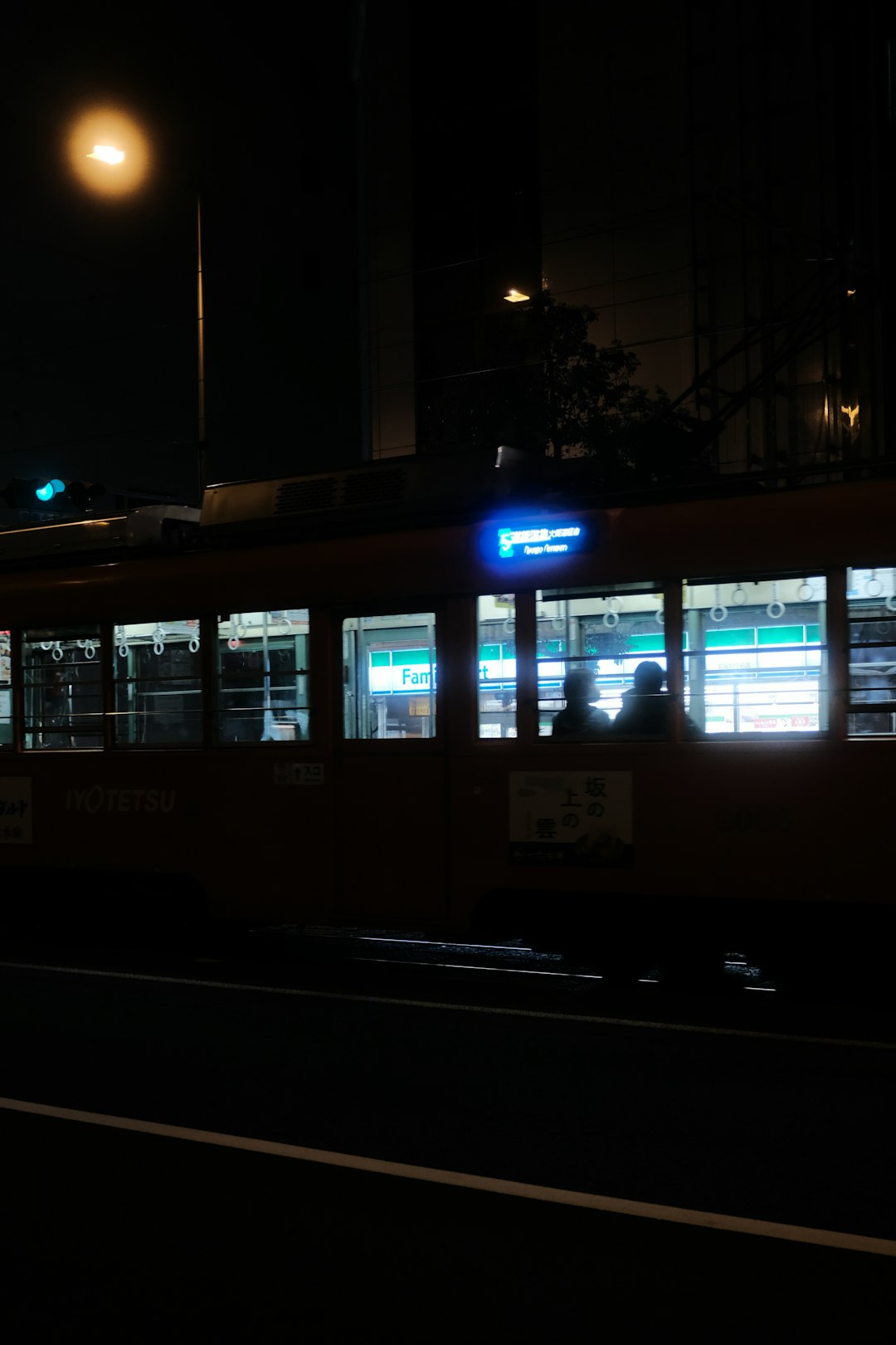 white and brown train during night time