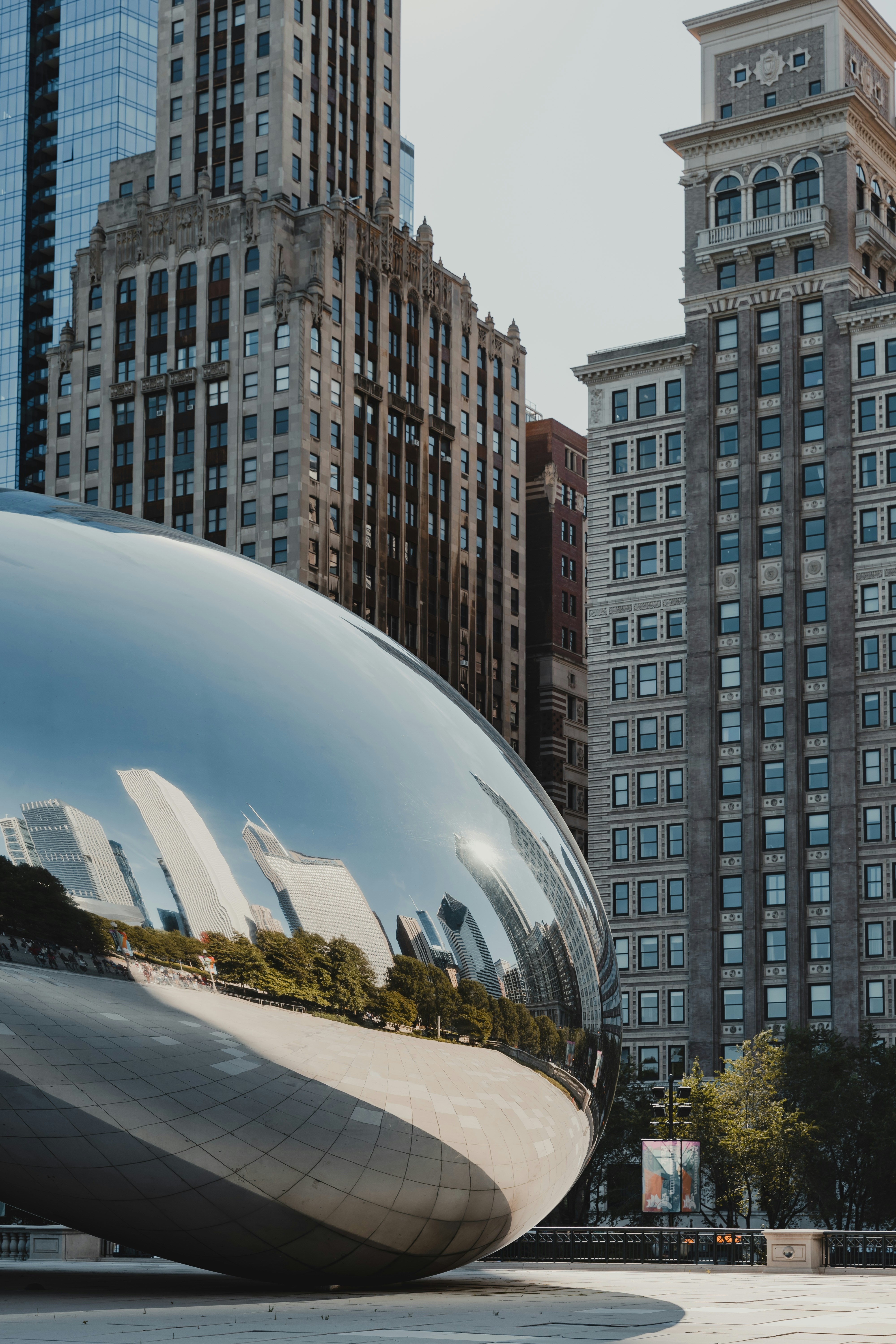 cars on road near high rise buildings during daytime