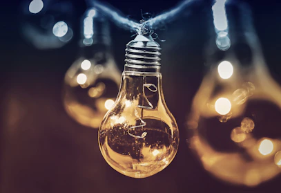 selective focus photography of light bulb