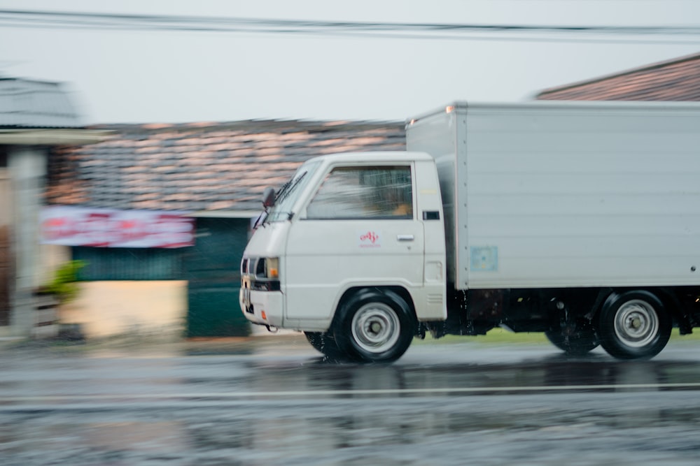 white van on road during daytime