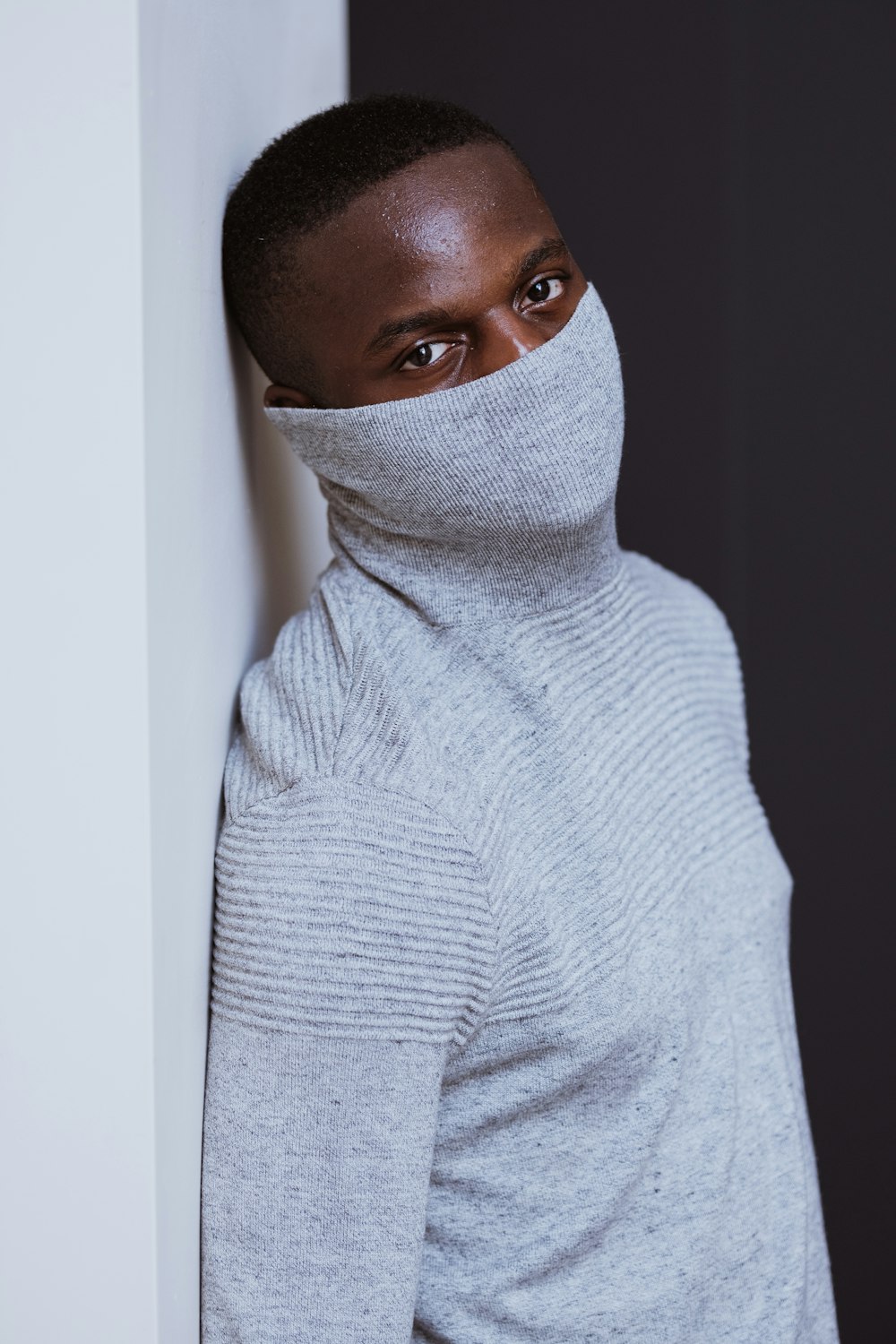 woman in white turtleneck sweater