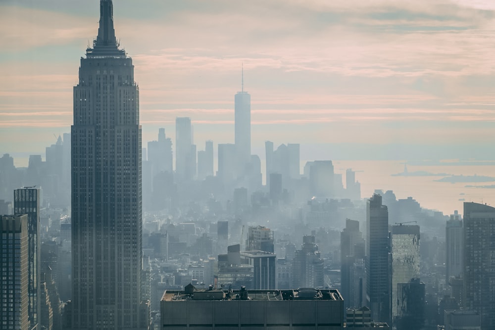 city skyline under white sky during daytime