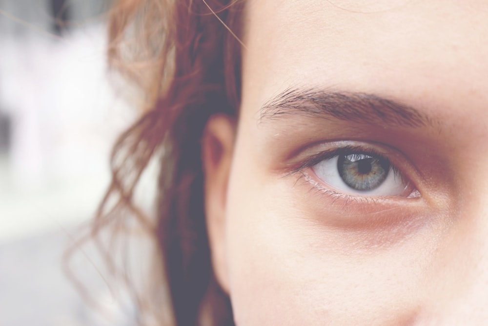 woman with brown hair and blue eyes