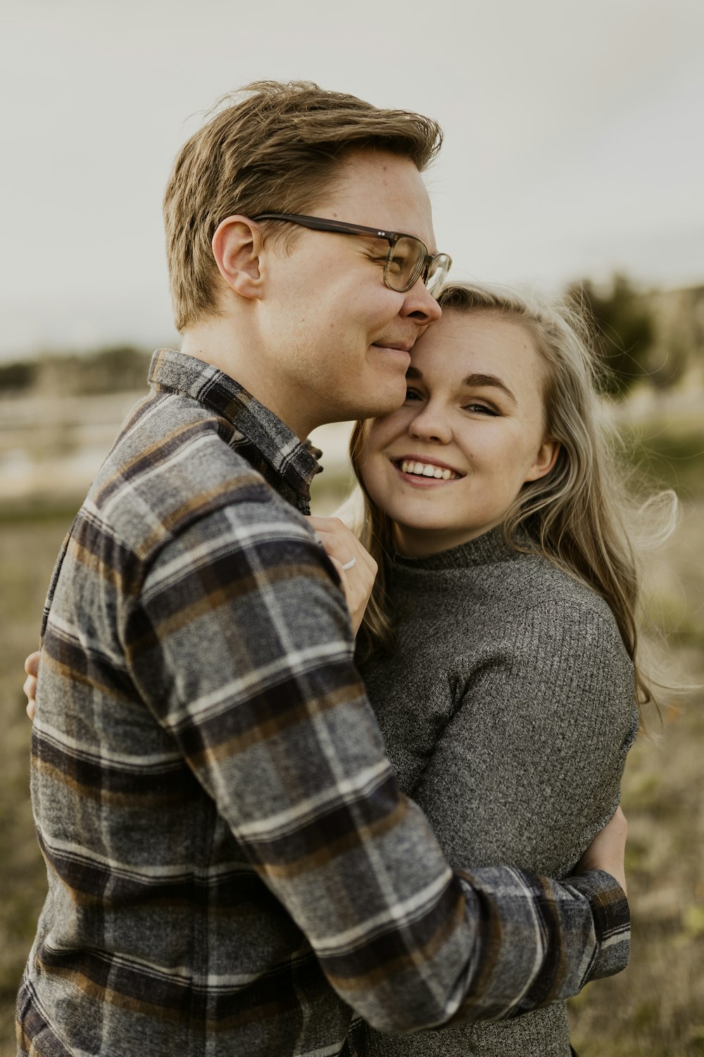 man and woman smiling during daytime