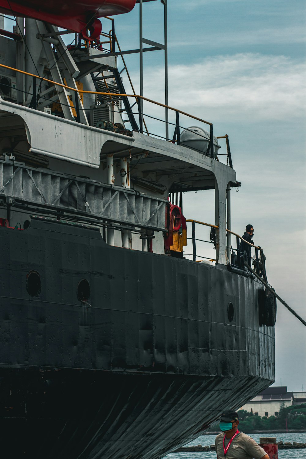 white and black ship on sea during daytime