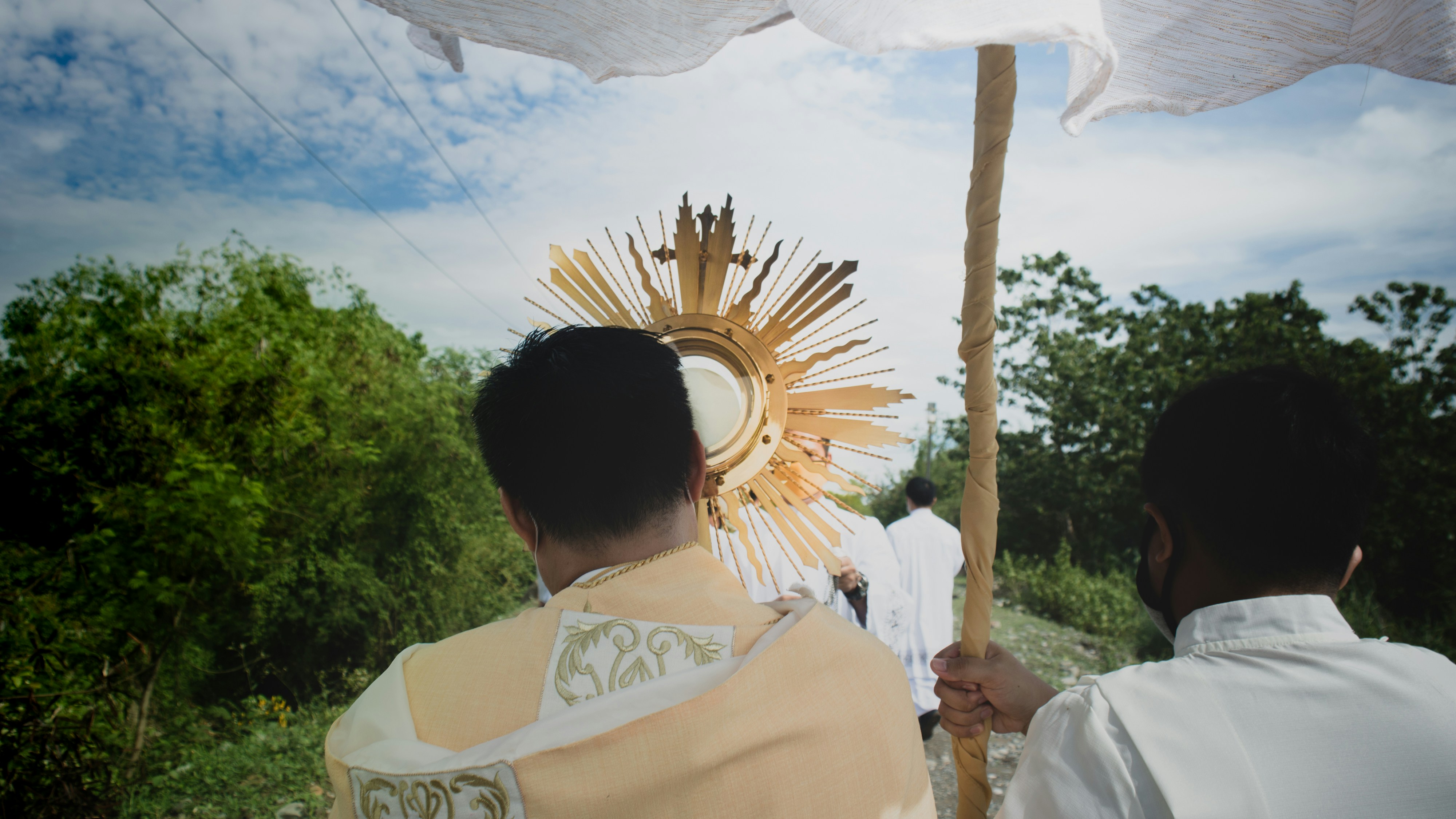 woman in white and yellow dress
