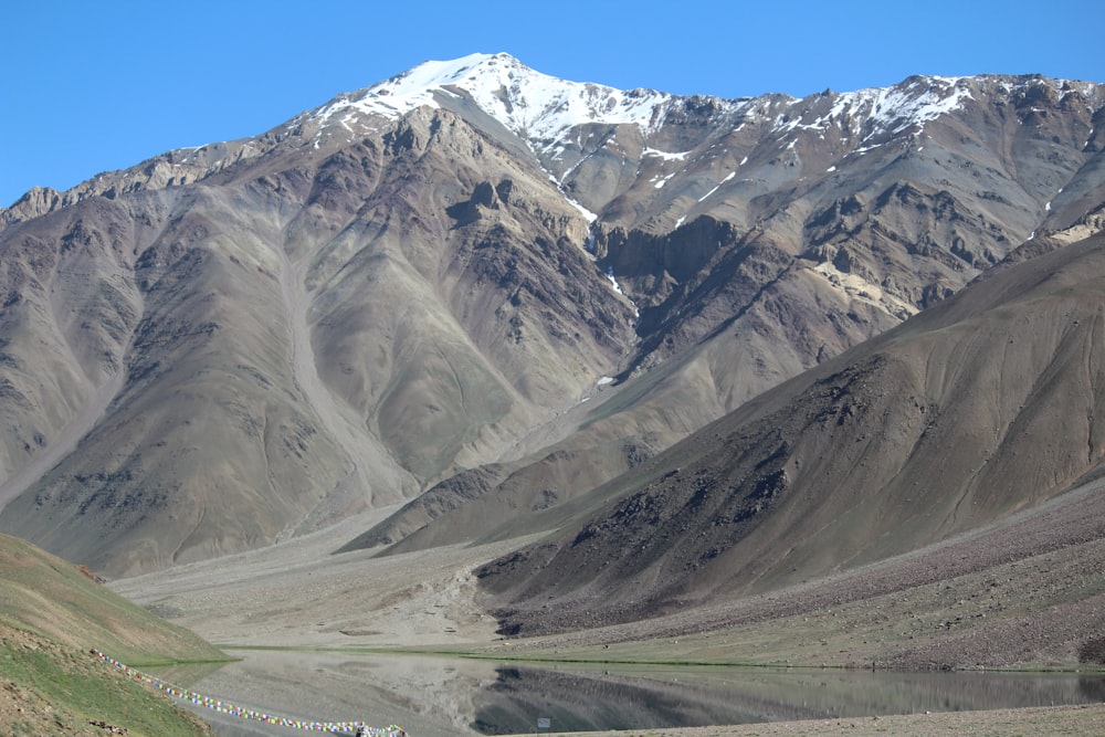 snow covered mountain during daytime