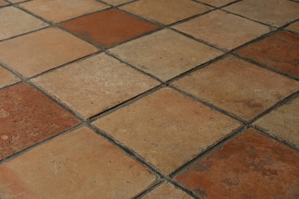 brown and white ceramic floor tiles