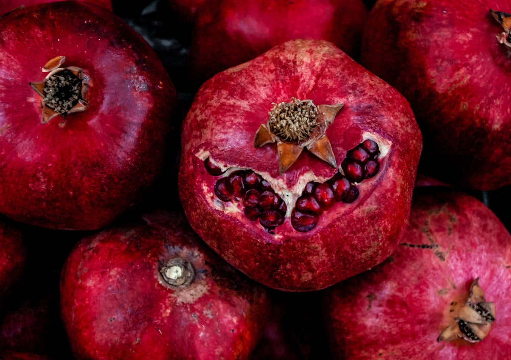 red apple fruit in close up photography