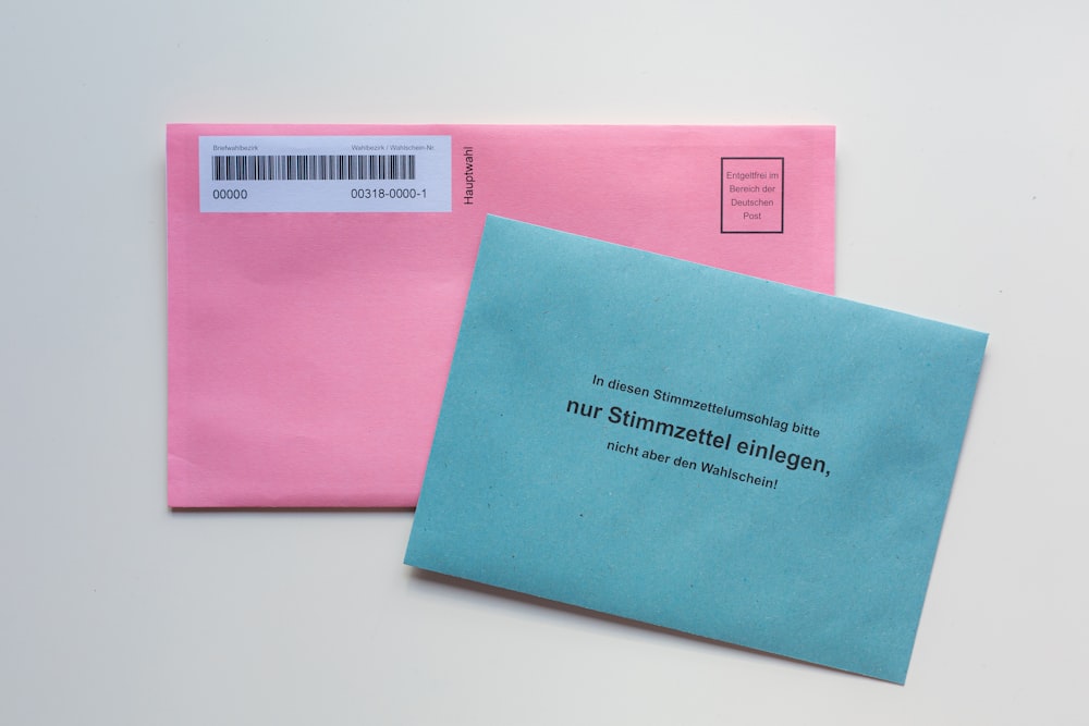 blue envelope on white table