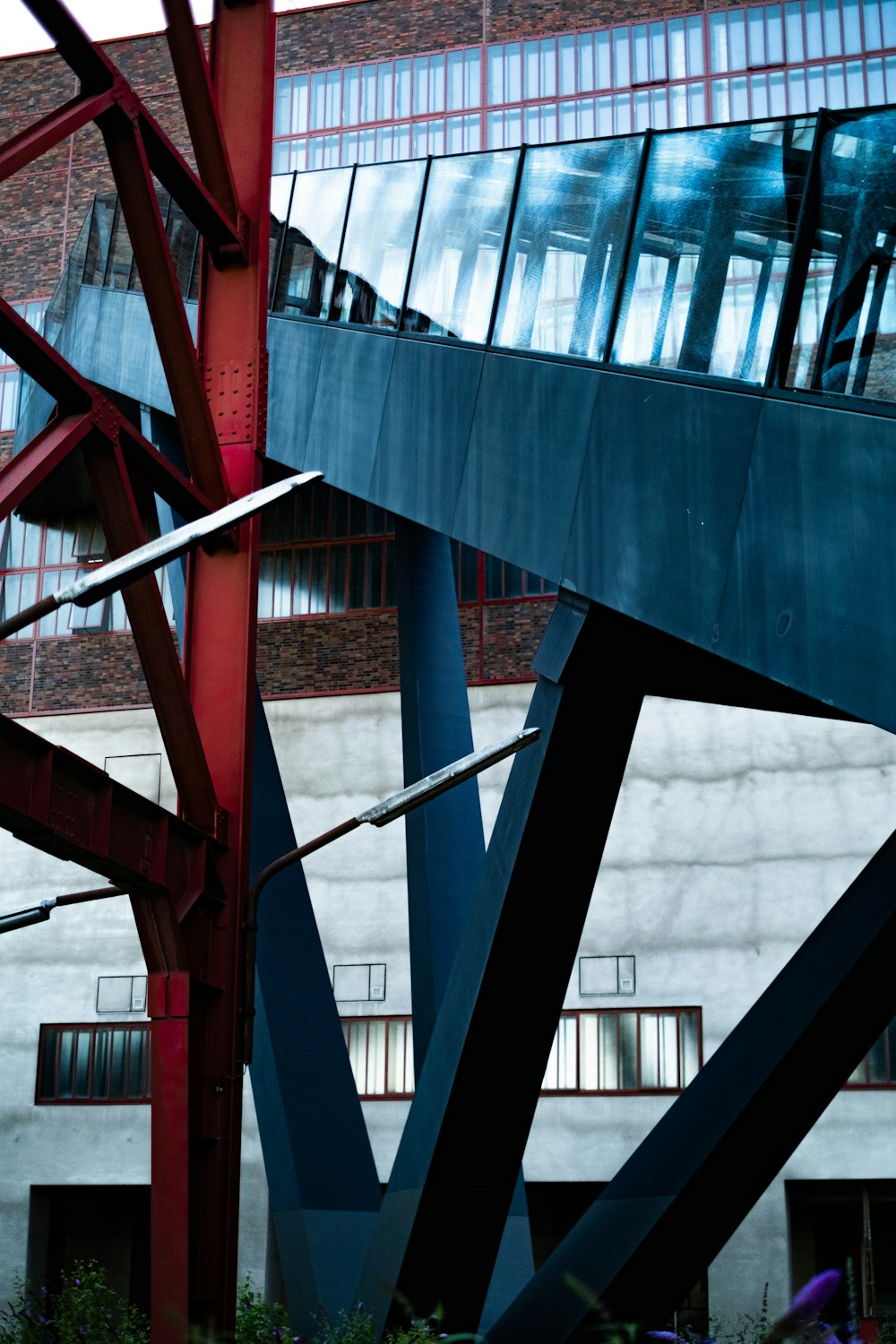 red metal bridge during daytime