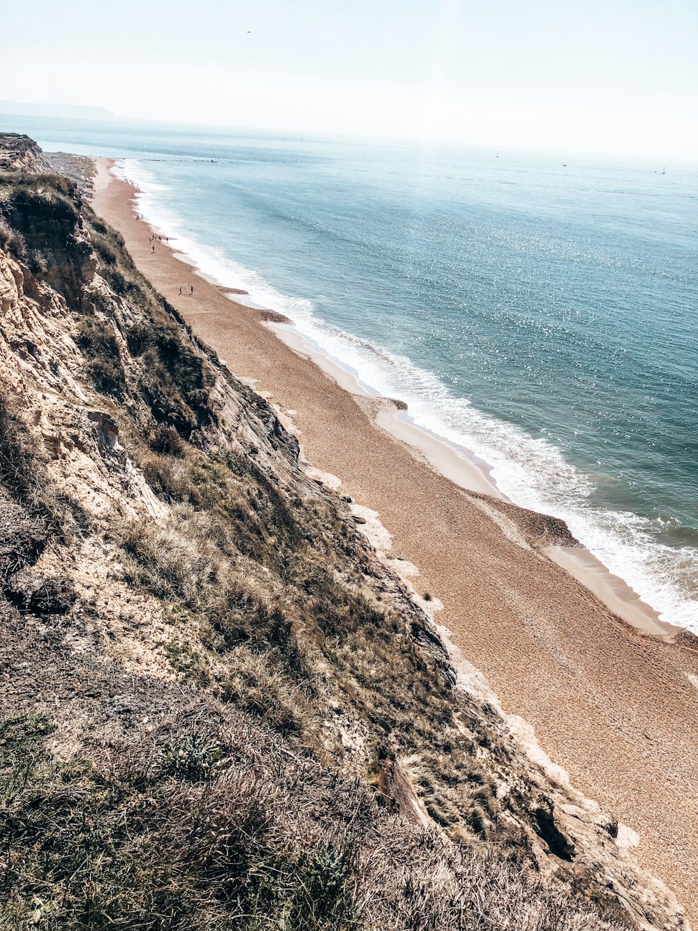 brown sand beach during daytime