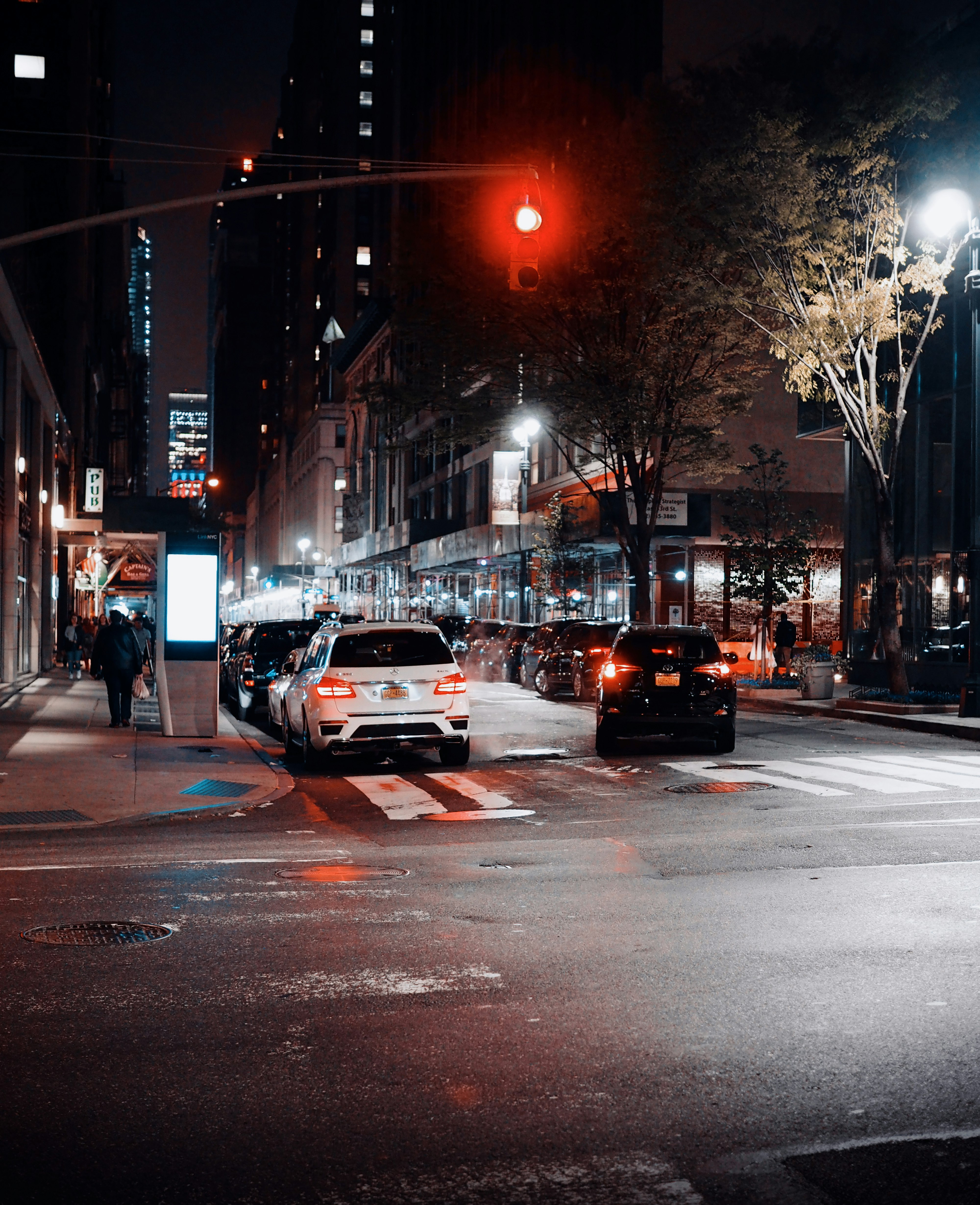 cars on road during night time