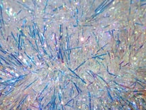 A close-up of hair tinsel shining in natural light.