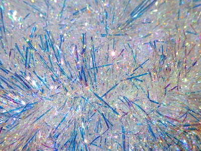 A close-up of hair tinsel shining in natural light.