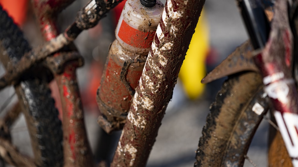 brown wooden stick with red and yellow paint