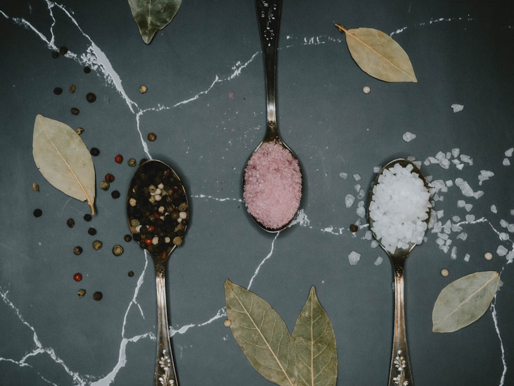 pink and brown ice cream on stainless steel spoon