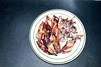 A plate of delicious squid prepared for serving.