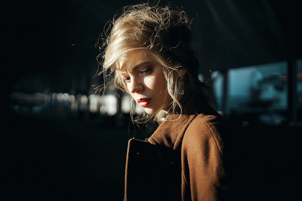 woman in brown long sleeve shirt