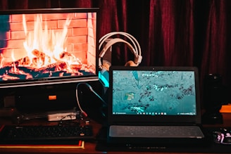 black flat screen computer monitor beside black computer keyboard