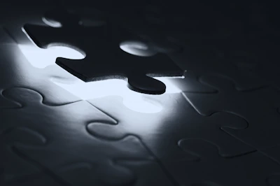 Sophisticated educational puzzle pieces with sleek design and soft shadows