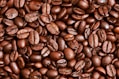 brown coffee beans on brown wooden table