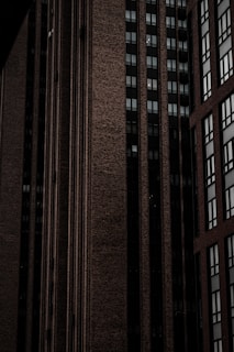 Close-up of textured brick and steel architecture, reflecting the district’s bold character