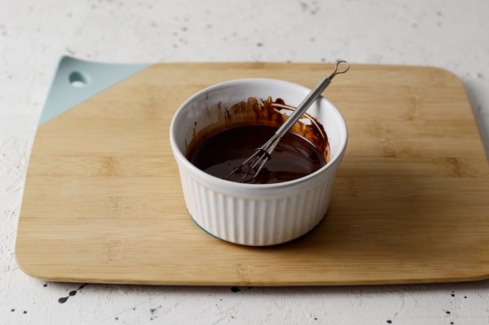 stainless steel fork in white ceramic bowl