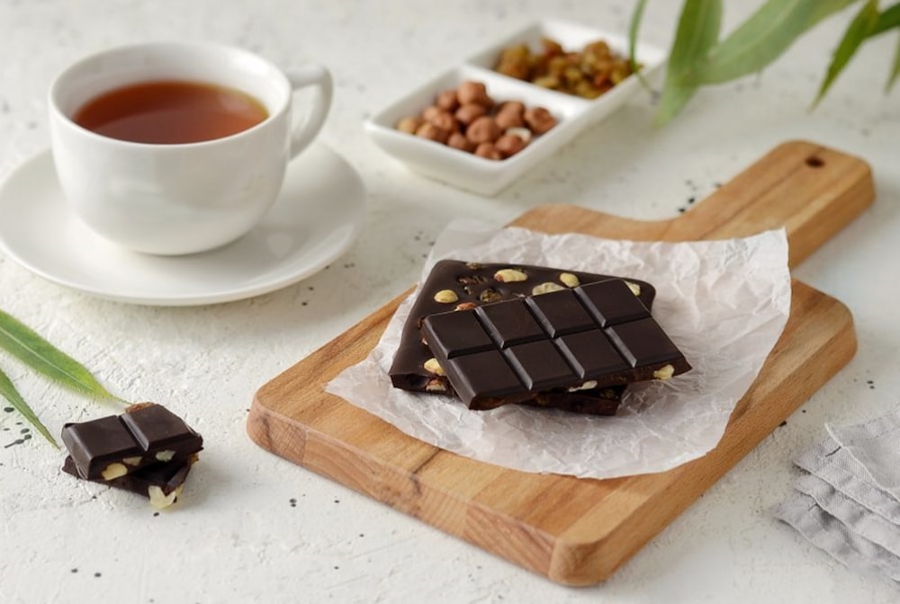 chocolate bar on white ceramic plate