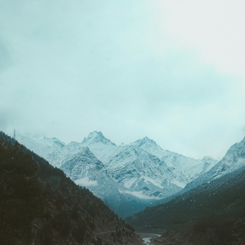 snow covered mountains during daytime