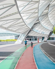 people walking on track field during daytime