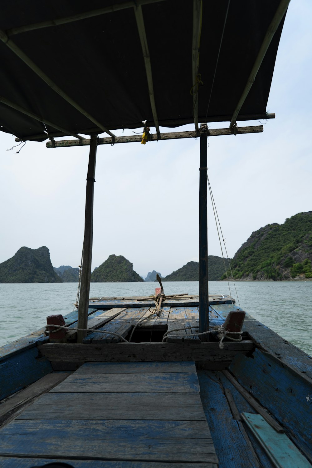 brown boat on blue sea during daytime