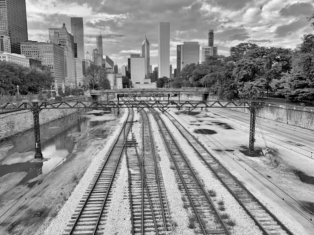 grayscale photo of train rail