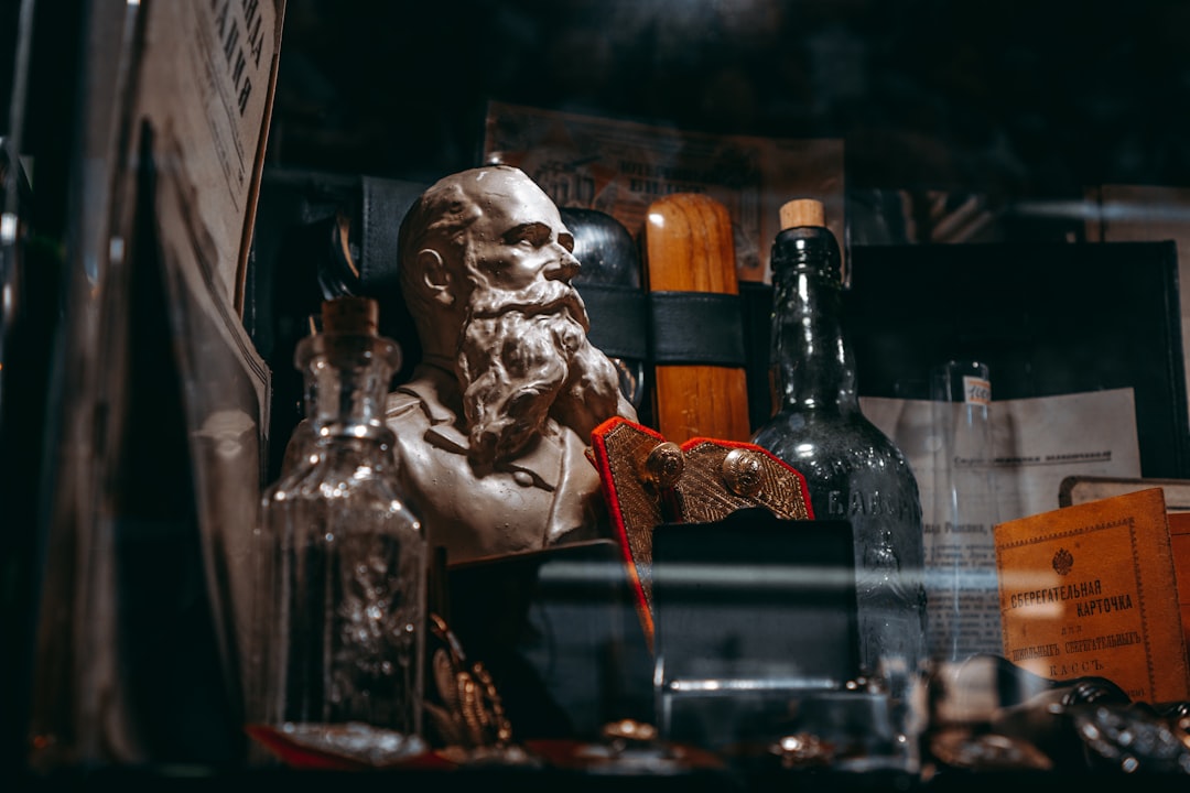 gold human skull on table