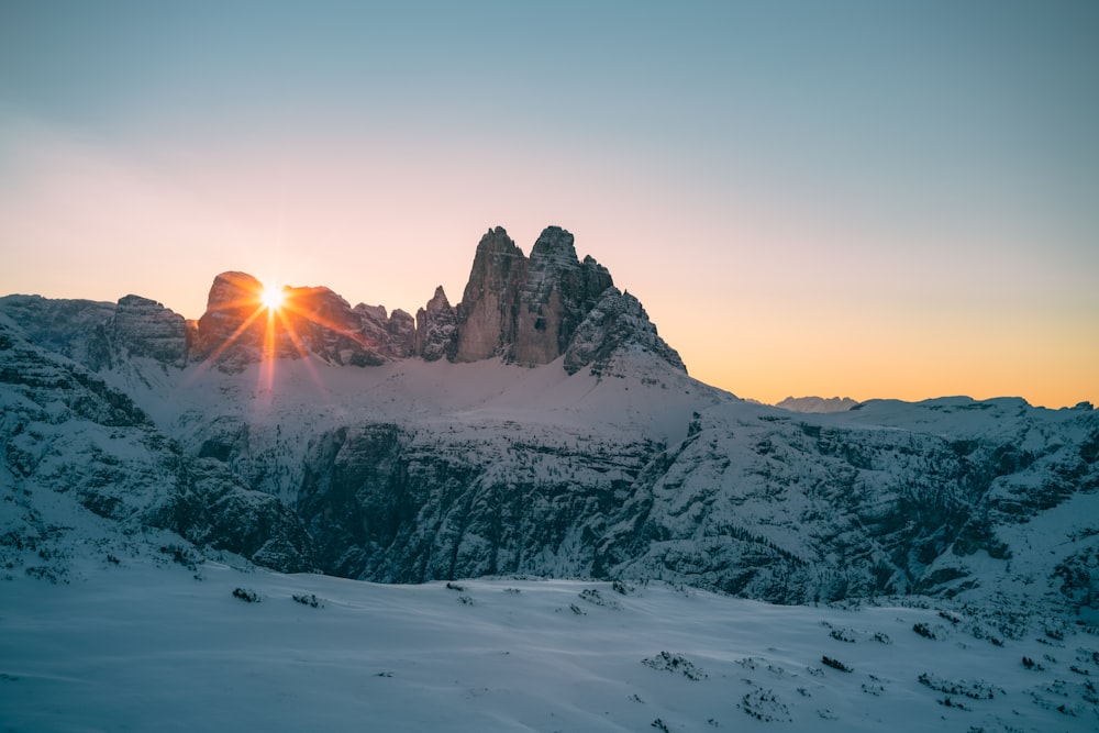 snow covered mountain during daytime