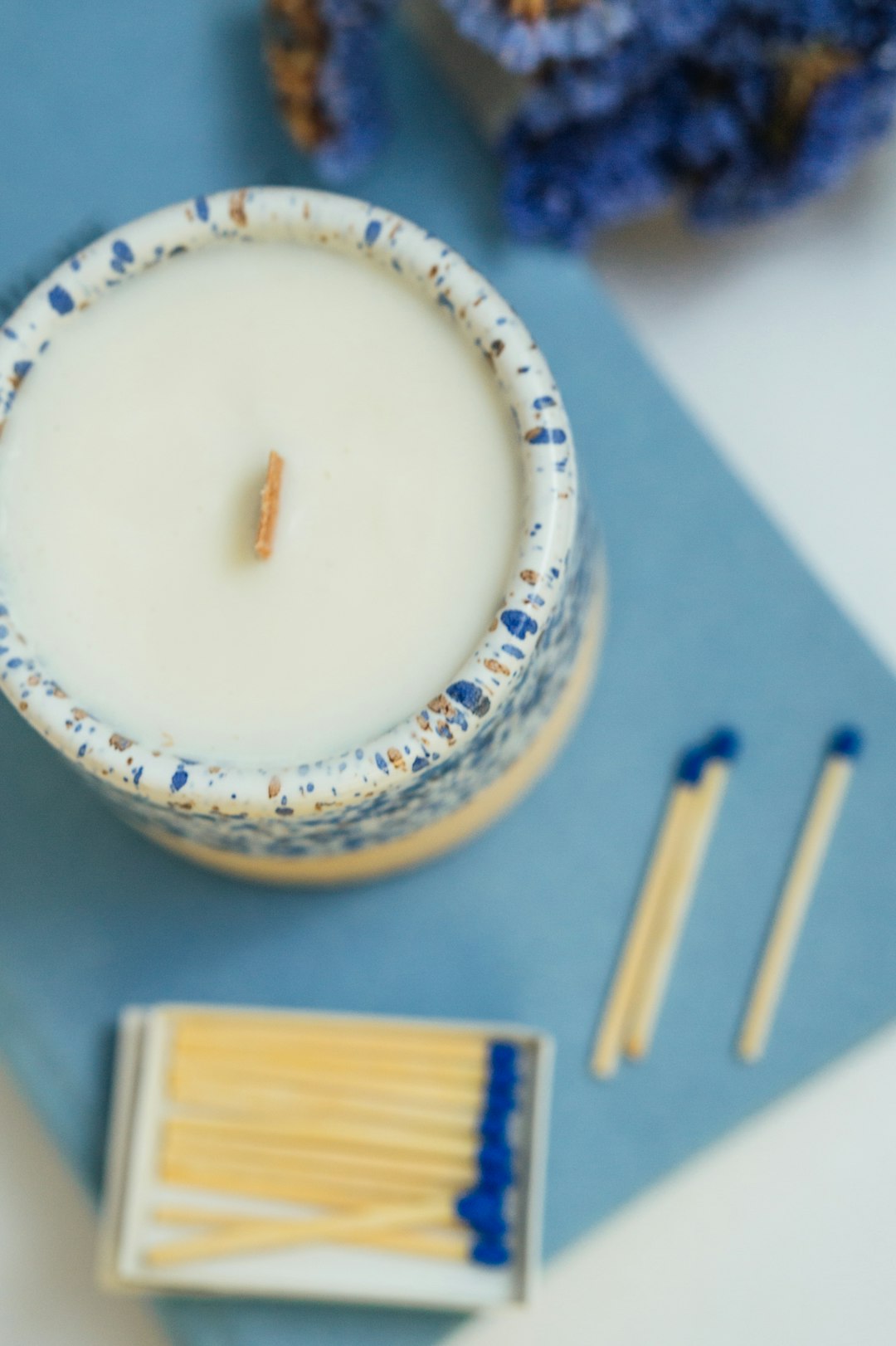 white and blue floral ceramic round plate