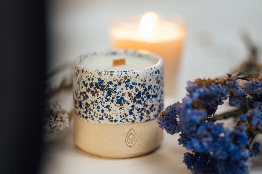 white and blue floral candle holder