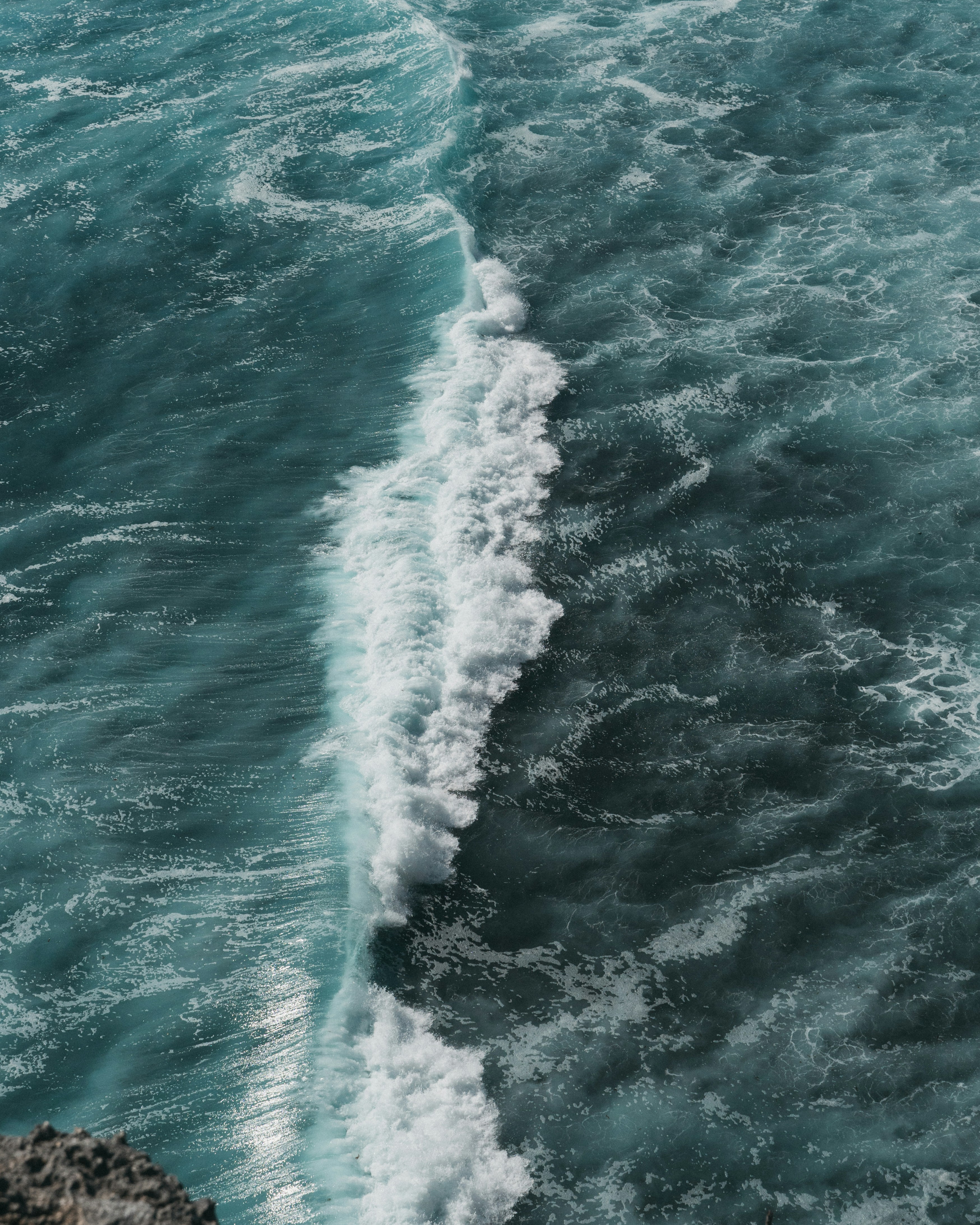 Ocean waves against a ship