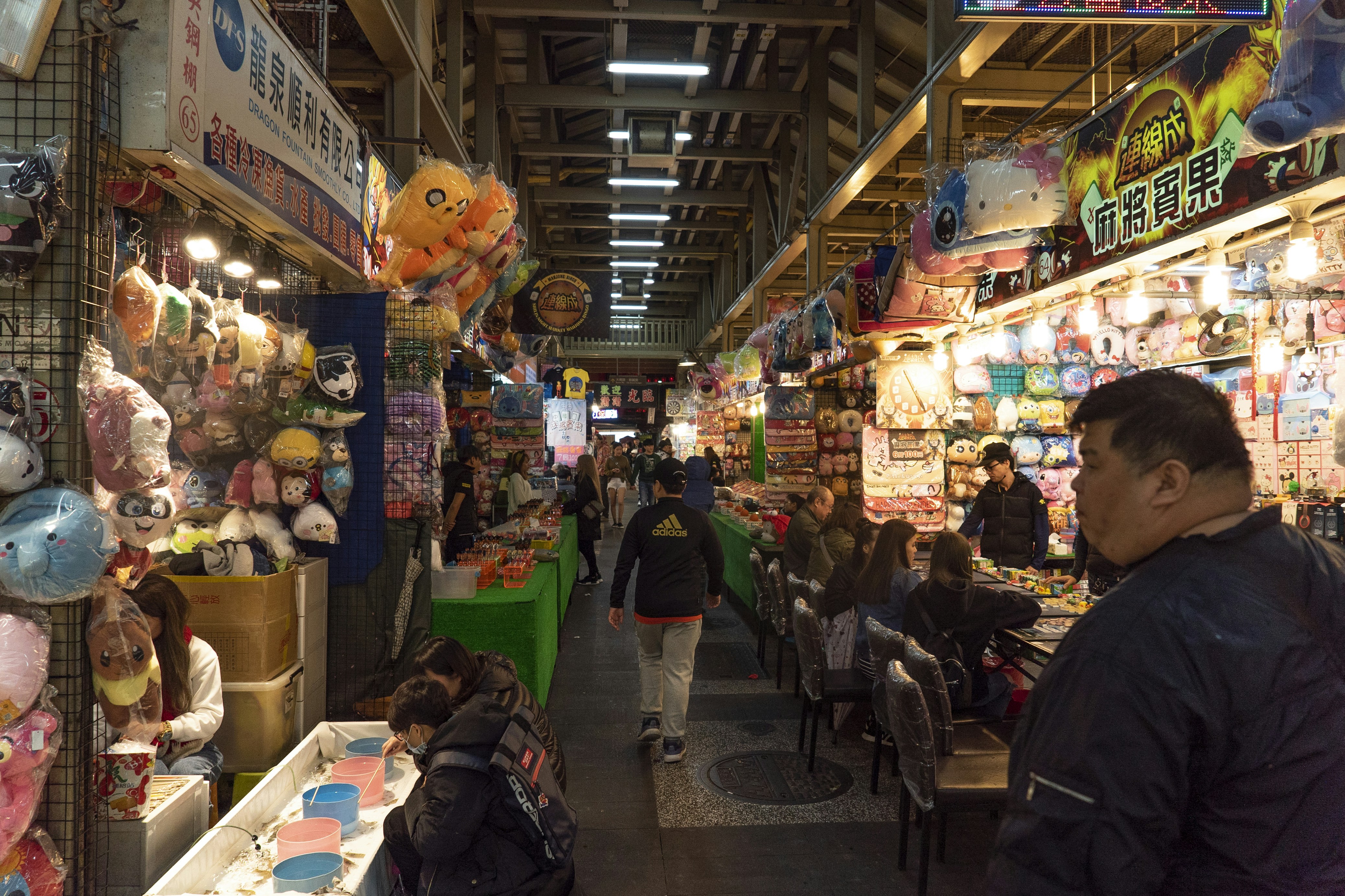 people sitting on chair inside store
