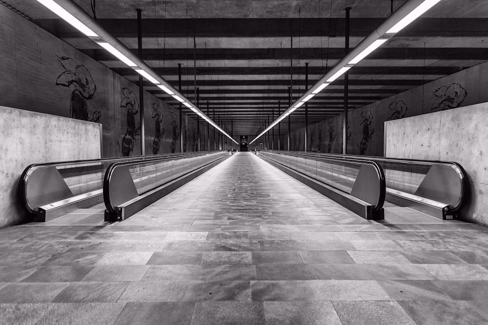 grayscale photo of empty train station