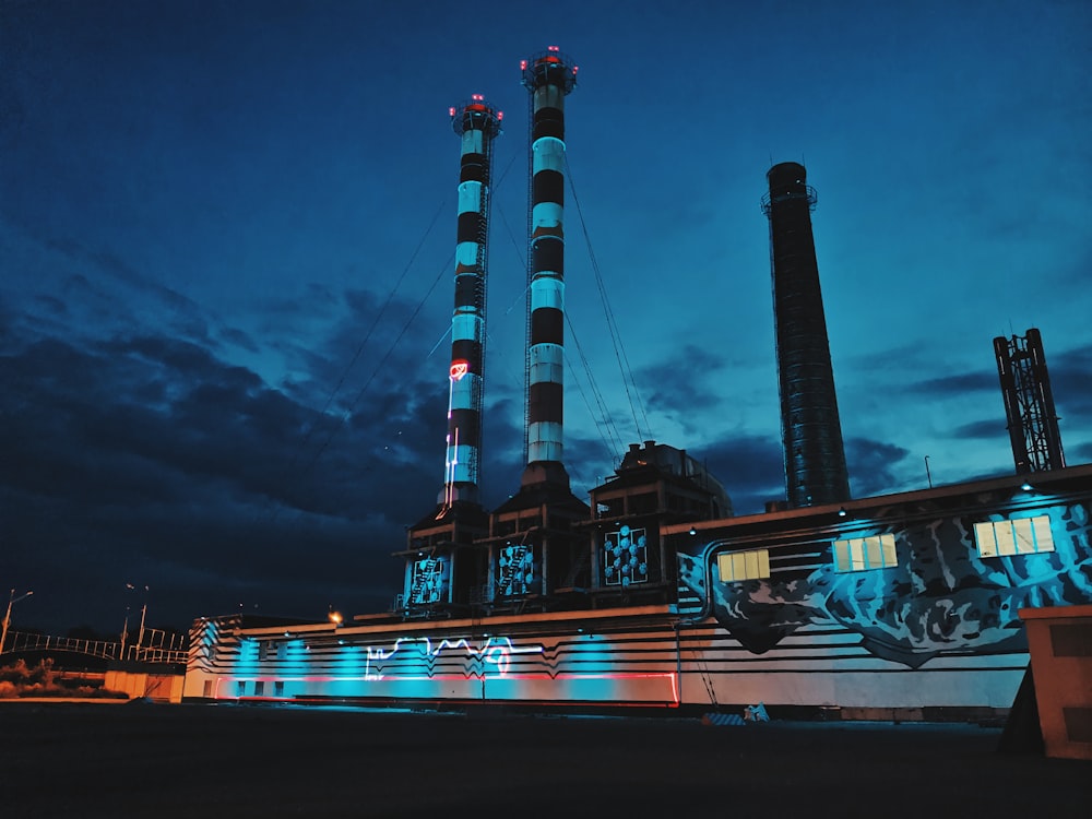 white and black ship on sea during night time