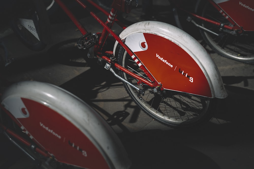 red and white honda motorcycle