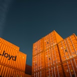 brown cardboard boxes under blue sky during daytime