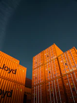 brown cardboard boxes under blue sky during daytime